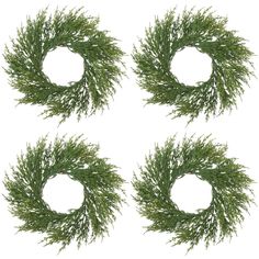 four wreaths with green leaves on white background