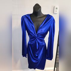 Nwot Medium Blue Satin Long Sleeve Very Low Cut Polyester/Spandex Great Price Elegant Blue Bodycon Dress For Club, Elegant Royal Blue Bodycon Dress For Night Out, Glamorous Blue Stretch Bodycon Dress, Blue Bodycon Party Dress, Blue Bodycon Dress For Parties, Royal Blue Bodycon Dress For Party, Blue Stretch Mini Dress For Party, Stretch Blue Mini Dress For Party, Royal Blue Bodycon Dress For Night Out