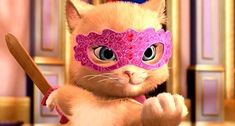 a cat wearing a pink mask and holding a wooden spoon