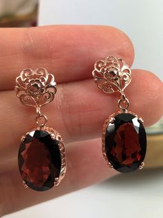 Natural Red Garnet Earrings, Rose-Gold plated Sterling Silver Filigree, Edward #E70, Vintage Reproduction Jewelry, Silver Embrace Jewelry Red Gem Earrings, Red Gem Jewelry, Garnet Earrings Gold, Hallmarked Oval Red Earrings, Red Oval Earrings For Formal Occasions, Formal Red Oval Earrings, Victorian Red Oval Earrings, Red And Gold Earrings, Edwardian Earrings