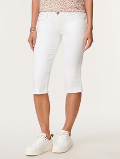 A fresh for warm-weather length and wash cut from soft-stretch premium denim for all-day comfort. This Capri length "Ab"solution® white skimmer jean is designed with power-mesh panels for total tummy control, a no-gap elastic waistband, and curved shaped pockets along with a sweetheart yoke for an instant "booty lift!" Optic white stretch jean Mid-rise Zipper fly with button closure Destruction detail Five-pocket style that includes and angeled coin pocket for a figure-flattering effect Skimmer White Stretch Jeans, Mesh Panel, Premium Denim, White Denim, Stretch Jeans, Warm Weather, Stretch Denim, Mid Rise, Capri