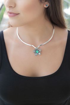 Did you know we sell chokers, too? Try out our slide chokers for a beautiful way to display your favorite LeightWorks pieces. Our Plumeria Pendant looks stunning at this length accentuated by the thick silver band of the choker.   Couple up our Plumeria Pendant with Slide Choker!   #chokerdress #choker❤ #chokernecklace #chokermania #chokers #chokerlover #chokersets #chokerstyle #chokercrystal #chokerset #chokerfashion #choker #leightworks #crystalpendant #davidLeight Handmade Crystal Jewelry, Choker Dress, Choker Style, Silver Band, Turquoise Necklace, Arrow Necklace, Did You Know