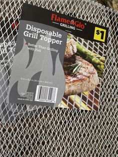 a grill grate with a piece of meat on top of it and a label that says, disposable grill topper