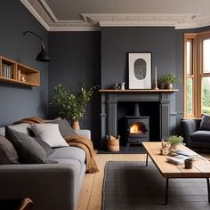 a living room filled with furniture and a fire place