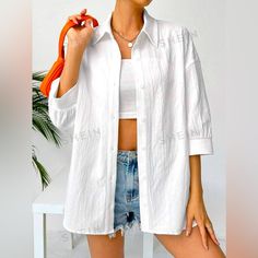 Color: White Style: Casual Pattern Type: Plain Type: Shirt Details: Button Neckline: Shirt Collar Sleeve Length: Half Sleeve Sleeve Type: Drop Shoulder Length: Regular Fit Type: Loose Fabric: Non-Stretch Material: Woven Fabric Composition: 97% Polyester, 3% Elastane Care Instructions: Machine Wash Or Professional Dry Clean Sheer:No Casual Beach Shirt With Roll-up Sleeves, White Summer Shirt With Button Closure, Spring Beach Shirt With Button Closure, Spring Beach Button-up Shirt, Beach Button-up Shirt With Pockets, White Button-up Summer Shirt, White Summer Button-up Shirt, Button-up Beach Shirt With Pockets, Beach Shirt With Pockets For Spring