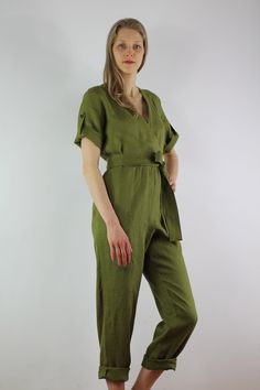 "Write the selected color in the message Linen jumpsuit with belt and 2 pockets in olive color, perfect for casual wear and suitable for any occasion in any season Details: - 100% natural linen produced in Europe ; - medium weight (180 gram per square meter); - color: olive, can be any from our colors catalog (color samples at the photo); Made to order, approximately a few days, If you have any questions please message me and I will be glad to answer. Size guide : Size XS Bust: fits bust around Casual Olive Jumpsuits And Rompers For Spring, Spring Linen Belted Jumpsuits And Rompers, Green Belted Jumpsuits And Rompers For Summer, Summer Green Belted Jumpsuits And Rompers, Green Tie Waist Jumpsuit For Work, Green Linen Jumpsuits And Rompers For Spring, Spring Green Linen Jumpsuits And Rompers, Green Belted Jumpsuits And Rompers For Work, Green Linen Jumpsuits And Rompers With Pockets