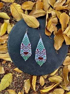 Christmas chic earring- Handwoven beaded earrings, modern earrings, christmas, festive, statement earrings, fringe earrings, gift for her ♥𝑀𝑎𝑑𝑒 𝑢𝑠𝑖𝑛𝑔 𝑓𝑟𝑒𝑒ℎ𝑎𝑛𝑑 𝑏𝑒𝑎𝑑𝑖𝑛𝑔 𝑤𝑜𝑣𝑒𝑛 𝑡𝑒𝑐ℎ𝑛𝑖𝑞𝑢𝑒𝑠 𝑤𝑖𝑡ℎ 𝑠𝑡𝑟𝑜𝑛𝑔 𝑠𝑦𝑛𝑡ℎ𝑒𝑡𝑖𝑐 𝑡ℎ𝑟𝑒𝑎𝑑. ♥𝑇ℎ𝑒 𝑠𝑖𝑧𝑒 𝑜𝑓 𝑡ℎ𝑒 𝑠𝑒𝑒𝑑 𝑏𝑒𝑎𝑑𝑠 𝑢𝑠𝑒𝑑 𝑖𝑠 2 𝑚𝑖𝑙𝑙𝑖𝑚𝑒𝑡𝑒𝑟𝑠 𝑎𝑛𝑑 𝑏𝑒𝑎𝑑𝑠 𝑎𝑟𝑒 ℎ𝑖𝑔ℎ 𝑞𝑢𝑎𝑙𝑖𝑓𝑖𝑒𝑑. ♥𝐴𝑙𝑙 𝑡ℎ𝑒 ℎ𝑜𝑜𝑘𝑠 𝑢𝑠𝑒𝑑 𝑖𝑛 𝑜𝑢𝑟 𝑗𝑒𝑤𝑒𝑙𝑟𝑦 𝑎𝑟𝑒 24 𝑘 𝑔𝑜𝑙𝑑 𝑝𝑙𝑎? Beaded Fringe Teardrop Earrings As Gift, Handmade Bohemian Beaded Earrings For Christmas, Bohemian Handmade Beaded Christmas Earrings, Handmade Teardrop Tassel Earrings For Gift, Bohemian Christmas Dangle Earrings, Handwoven Tassel Drop Earrings As A Gift, Handwoven Tassel Drop Earrings For Gift, Handwoven Chandelier Dangle Earrings As Gift, Handmade Festive Tassel Earrings