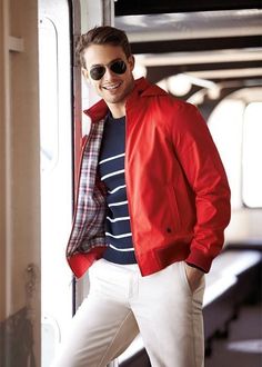 Pairing a red leather bomber jacket with white chinos is a comfortable option for running errands in the city.  Shop this look for $747:  http://lookastic.com/men/looks/dark-brown-sunglasses-red-bomber-jacket-navy-and-white-crew-neck-sweater-white-chinos/5997  — Dark Brown Sunglasses  — Red Leather Bomber Jacket  — Navy and White Horizontal Striped Crew-neck Sweater  — White Chinos Red Jacket Outfit, White Chinos, Preppy Men, Wearing Sunglasses, Fall Fashion Trends, Mens Casual Outfits, Leather Jacket Men