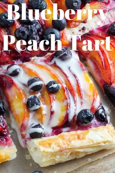 blueberry peach tart on a wooden cutting board