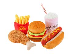 a hot dog, hamburger and french fries on a white background