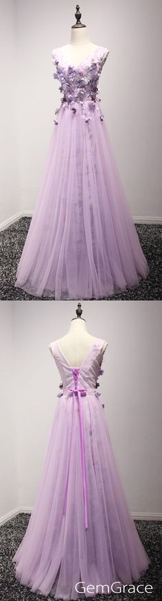 V-neck Tulle Gown For Debutante Ball, Lavender Tulle Gown For Prom, Lavender Tulle Ball Gown For Prom, V-neck Tulle Gown For Prom Season, Tulle V-neck Gown For Debutante Ball, Purple Tulle Fairy Dress In Whimsical Style, Purple Floor-length Dress With Sheer Bodice, Prom Dress With Flowers, Purple Tulle Floor-length Gown