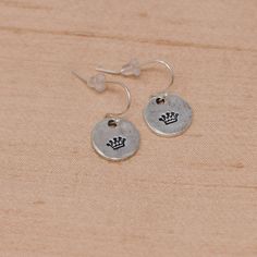 These simple and sweet dangly earrings are a lightweight option to wear your Heaven Inspired word. An everyday staple meant to encourage you. Our team prays over you (or your loved one!), hand stamps the icon they feel God is highlighting, and include a personalized note for the recipient. Buy for yourself or give as a gift to a friend! This piece includes a personalized card explaining what we heard for you. This keepsake piece of jewelry is a reminder of God's thoughts towards you. Want to rea Personalized Sterling Silver Earrings For Birthday, Simple Adjustable Hand Stamped Jewelry, Personalized Minimalist Dangle Earrings, Personalized Silver Earrings For Birthday, Nickel Free Sterling Silver Earrings For Birthday, Nickel-free Sterling Silver Earrings For Birthday, Inspirational Hypoallergenic Everyday Jewelry, Everyday Inspirational Hypoallergenic Jewelry, Inspirational Everyday Hypoallergenic Jewelry