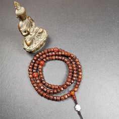 ❤ This old rudraksha mala was handmade from tibetan crafts man in Baiyu County.It's composed of 108 pcs 7mm rudraksha beads,with agate beads,agate guru bead,and silver lucky knot pendant.❤Details:Mala'perimeter is 60cm,24 inches.108 rudraksha beads approximately 7mm / 0.28 inch.1 × agate main bead,diameter 10mm / 0.4 inch.2 × agate maitreya beads diameter 10mm / 0.4 inch.1 × agate guru bead,18mm × 8mm / 0.7 × 0.3 inch.1 × silver lucky knot pendant,10mm × 8mm / 0.4 × 0.32 inch.❤Malas are used all Lotus Sutra, Rudraksha Mala, Rudraksha Beads, Beads Mala, Green Tara, The Monks, Rosary Beads, Mala Beads, Prayer Beads