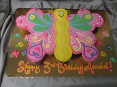 a birthday cake with a butterfly on it