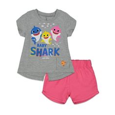 Put your hands, arms, and fins together for Baby Shark Brooklyn and his family! With a Doo doo doo doo doo doo," dive deep down under the sea to dance and sing along with Baby Shark, Daddy Shark, Mommy Shark, Grandpa Shark, and Grandma Shark. Your little one will look so cute and will love wearing this adorable Baby Shark Short Sleeve T-Shirt & Shorts. Size: 6.  Color: Gray.  Gender: female.  Age Group: infant. Shark Girl, Shark T Shirt, Girl's Back, Shorts Outfit, Soft Clothes, Baby Shark, Clothing Essentials, T Shirt And Shorts, Graphic Tee Shirts