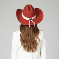 A chic western-inspired rancher cowboy hat featuring a cattleman crease crown. Add some flame to every festival and concert you are planning this year with a hat that will do all the talking fo you. Triple braided wrap trim and the back western concho adds more to the flair. ? Features : Brim Size: 3.75" 100% wool Color: Rust Women's one size ( 57 cm, 22.5 inches) Adjustable internal drawstring for a tighter fit Triple braided wrap trim with back western concho Southwestern Wide Brim Felt Hat For Western-themed Events, Southwestern Fitted Hats For Rodeo, Adjustable Western Hat Bands For Fall, Western Hats For Ranch, Fitted Western Straw Hat For Ranch, Southwestern Concho Hat For Rodeo, Western Red Hat For Country Events, Southwestern Style Concho Hat For Rodeo, Western Fedora Straw Hat For Rodeo