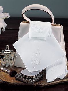 Delicate hand embroidery adds to the sheer beauty of our imported ladies' handkerchiefs of gossamer-like 100% pure cotton. Impeccable in White,... Elegant White Handkerchiefs As Gift, Elegant White Handkerchiefs Gift, Elegant White Handkerchiefs With Initials, Elegant Handkerchiefs With Initials For Wedding Gift, Elegant Monogrammed Handkerchiefs For Weddings, Elegant Monogram Handkerchiefs For Wedding, Elegant Initials Handkerchiefs For Wedding Gift, Elegant White Handkerchiefs For Wedding Gift, Elegant Embroidered Handkerchiefs For Wedding Gift