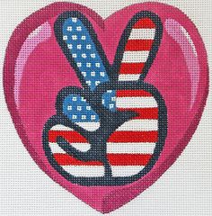 the peace sign is painted on top of a pink heart with an american flag pattern