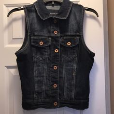 Maurices Dark Denim Vest With Button Closure Down Front And 2 Front Pockets With Button Closures Size Small 70% Cotton 28% Polyester 2% Spandex Excellent Like New Condition Looks Brand New Smoke Free Home Fitted Button-up Casual Denim Vest, Fitted Button-up Denim Vest, Casual Dark Wash Denim Vest With Buttons, Medium Wash Casual Denim Vest With Buttons, Casual Medium Wash Denim Vest With Buttons, Casual Button-up Denim Vest With Button Closure, Trendy Dark Wash Denim Vest With Snap Buttons, Fitted Casual Denim Vest With Buttons, Casual Fitted Denim Vest With Buttons