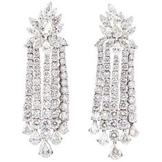 Just under 30 carats of diamonds! A FABULOUS pair of important diamond earrings! 29.15 carats of F/G VS diamonds set in platinum. Approximately 2.6 inches in length. Pearl Chandelier Earrings, Diamond Chandelier Earrings, Noble Lady, Diamond Chandelier, Expensive Diamond, Pearl Chandelier, Gold Chandelier Earrings, Front Back Earrings, Fantasy Gifts