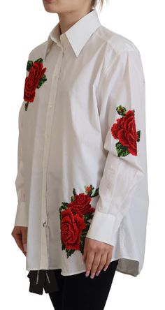 Step into a world of sophistication with this pristine white shirt, accented by delicate rose embroidery, a touch that speaks of the attention to detail and Italian craftsmanship Dolce & Gabbana is renowned for. A perfect blend of cotton and silk offers you a comfortable yet luxurious experience, suitable for formal occasions or when you wish to add an elegant flair to your everyday wardrobe. Material: 78% Cotton 22% Silk Color: White Country of origin: IT Brand: Dolce & Gabbana Logo details Mad Cotton Flower Embroidery, Embroidery Shirt, Formal Tops, Rose Embroidery, Shirt Embroidery, Dolce E Gabbana, Flower Embroidery, Elegant Floral, Embroidered Silk