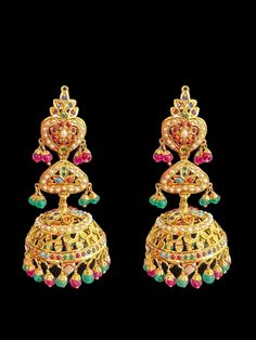 Gold plated silver jhumka rubies and emeralds with fresh water pearls used gwt - 35.26 gms height -3 inches Hand-set 22k Gold Jhumkas For Celebrations, 22k Gold Hand Set Jhumkas For Celebration, Ceremonial Kundan Jhumkas With Hallmark, Ceremonial Kundan Jhumkas Hallmarked, Festive Temple Jewelry Jhumkas Hallmarked, Bollywood Style Chandbali Jhumkas Hallmarked, Bollywood Chandbali Jhumkas, Festive Hallmarked Temple Jhumkas, Bollywood Style Kundan Jhumkas With Hallmark