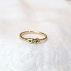 Our Trio ring in 14k, set with shimmering, bright green emeralds. A gorgeous low-profile ring in an enchanting tone. Materials: 14k yellow gold, green emeralds Elegant Green Emerald Cut Stackable Rings, Elegant 14k Stamped Emerald Ring, Oval Green Rose Cut Diamond Rings, Emerald Cut Green Ring With Rose Cut Diamonds, Fine Jewelry Green Emerald-cut Stackable Rings, Fine Jewelry Green Emerald Cut Stackable Rings, Fine Jewelry 14k Gold Green Emerald Ring, Emerald Cut Green Stackable Rings Fine Jewelry, 14k Gold Green Emerald Ring, Fine Jewelry