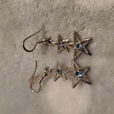 Stylish Silver And Blue Star Earrings. Brand New, Never Worn. Great Gift Idea Or Gift For Yourself! Offers Welcome! Silver And Blue Earrings, Blue Star Charm Earrings For Gift, Blue Star Charm Earrings As Gift, Blue Star Earrings With Star Charm, Blue Star-shaped Celestial Earrings, Blue Star-shaped Jewelry For Party, Blue Star-shaped Sterling Silver Earrings, Blue Star Charm Earrings For Party, Blue Sterling Silver Star Earrings