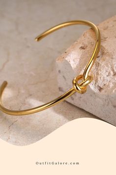 Dive into chicness with our Knot Design Cuff Bracelet in Stainless Steel. Ideal for those who value both style and substance. 🌸 This bracelet combines a unique twist with the resilience of stainless steel. Click to shop and add a modern touch to your collection! 🛍️ Elegant Adjustable Cuff Bracelet For Friendship, Modern Cuff Bracelet Bangle As Fashion Accessory, Vintage Gold Bracelets For Friendship, Trendy Cuff Bangle For Friendship, Trendy Cuff Bangle Bracelet For Friendship, Vintage Gold Bracelet For Friendship, Trendy Friendship Bangle Cuff Bracelet, Gold Vintage Friendship Bracelet, Trendy Cuff Bracelet For Friendship