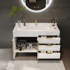 a bathroom vanity with two drawers and a round mirror above it, in front of a gray wall