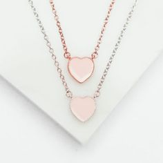 Pink enamel heart necklace on adjustable chain. Available in Sterling Silver and Rose Gold plated sterling silver 8mm Heart Blush Enamel Detail Fully Adjustable: 14 Inches Long With a 2 Inch Extender. Can be Worn at 14, 15 or 16 Inches Dainty Rose Gold Heart Beads Necklace, Rose Gold Charm Necklaces For Bridesmaids, Rose Gold Heart Necklace With Adjustable Chain, Rose Gold Sterling Silver Jewelry With Heart Beads, Rose Gold Dainty Heart Necklace With Adjustable Chain, Delicate Rose Gold Heart Necklace With Adjustable Chain, Dainty Rose Gold Heart Necklace With Adjustable Chain, Delicate Rose Gold Heart Necklace For Mother's Day, Delicate Rose Gold Heart Necklace