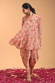 Pink and multi color full sleeves short flared kurta with all over gullista print, sequin coin embellishments and bloom embroidery on the sleeves hem. Paired with a matching dhoti pant. - Aza Fashions Traditional Pant Set With Sheer Dupatta And Drape, Traditional Pink Pant Set With Traditional Drape, Floral Print Sets With Traditional Drape For Transitional Season, Traditional Harem Sets For Summer, Traditional Summer Harem Sets, Summer Cotton Silk Sets With Traditional Drape, Kurta With Dhoti, Bloom Embroidery, Kurta Patterns