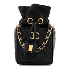 This is an authentic CHANEL Calfskin Quilted Mini Drawstring Bucket Bag in Black. This chic shoulder bag is crafted of luxurious diamond-quilted calfskin in black. The bag features a leather-threaded gold chain shoulder strap and a flap with a matching gold classic CC turn lock. The flap opens to a black leather and fabric interior. 1398289 Chanel Dust Bag, High-end Quilted Shoulder Bag For Formal Occasions, Designer Formal Bags With Diamond Quilting, Designer Diamond Quilted Formal Bags, High-end Quilted Bags For Formal Occasions, High-end Quilted Formal Bag, High-end Formal Quilted Bags, Black Diamond Quilted Bag For Everyday Luxury, Luxury Black Shoulder Bag With Diamond Quilting