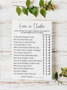 a printable over or under poem on a white wooden background with flowers and greenery