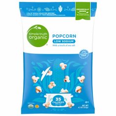 the bag of organic popcorn is shown on a white background with blue and green accents