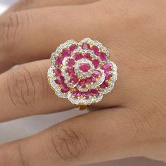 Flower Shaped Diamond Rings With Gemstones, Elegant Ruby Rings With Flower Shape, Fine Jewelry Flower Cluster Ring With Gemstone, Ruby Jewelry In Flower Shape For Anniversary, Fine Jewelry Hallmarked Flower Ring, Elegant Ruby Flower-shaped Rings, Exquisite Flower Shaped Gemstone Rings, Elegant Ruby Flower Rings, Ruby Flower-shaped Jewelry For Anniversary