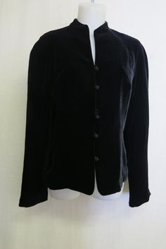 "Goth Black Velvet Ann Taylor Jacket What a very elegant garment! Just Dreamy! Perfect to top off your dressy outfit Satin lined with lovely frog type buttons This is a beautiful, beautiful garment... Rayon and silk...very fine and soft Excellent, like new condition Made in USA Size 10 Medium Soft dropped shoulder 38\" waist 38\" bust 23\" Length 18\" sleeve from underarm https://www.etsy.com/shop/BelindasStyleShop" Classic Party Outerwear With Button Closure, Evening Blazer With Covered Buttons And Long Sleeves, Elegant Evening Outerwear With Stand Collar, Evening Blazer With Covered Buttons, Classic Evening Outerwear With Button Closure, Classic Evening Blazer With Covered Buttons, Winter Evening Blazer With Buttons, Classic Evening Outerwear, Semi-formal Long Sleeve Outerwear With Covered Buttons