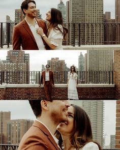 a man and woman standing on top of a brick building next to each other with buildings in the background