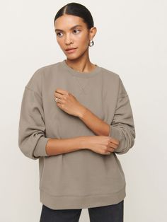 Shop the Drew Vintage Oversized Crewneck Sweatshirt from Reformation, a full-length sweatshirt with a relaxed fit and crew neckline. Relaxed Fit Sweatshirt For Layering, Relaxed Drop Shoulder Sweatshirt For Layering, Relaxed Crew Neck Sweats For Fall, Relaxed Crew Neck Sweater For Fall, Relaxed Crew Sweater For Fall, Relaxed Fit Sweatshirt With Ribbed Neckline For Fall, Relaxed Crew Neck Spring Sweatshirt, Relaxed Crew Neck Sweatshirt For Spring, Relaxed Crew Neck Sweatshirt For Fall