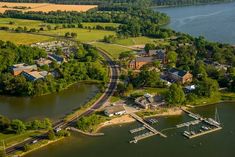 an aerial view of a small town by the water