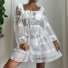 Rare For Love And Lemons X Victoria's Secret Collab. Chiffon Sheer Frill Cottage Fairy Core Peasant White Long Sleeve Mini Dress. Lace Hem, Tie Adjustable Chest / Shoulders, Tie Adjustable Wrists, Mini Front Buttons, Small Key Hole, Polka Dots And Heart Print. Brand New With Tags! Dainty Prairie Boho Bohemian Dream! Summer Mini Dress With Lace Patchwork For Daywear, White Sheer Mini Dress For Daywear, Sheer Mini Summer Dress, Summer Mini Length Sheer Dresses, White Lace Patchwork Mini Dress For Vacation, Sheer Mini Dress For Vacation, White Sheer Mini Dress For Vacation, Sheer Mini Dress For Daywear, White Mini Dress With Lace Patchwork For Daywear