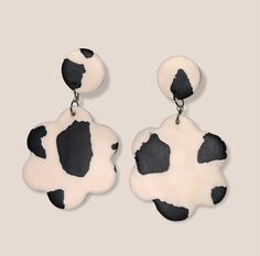 These cow print earrings are made from faux-leather-style polymer clay. They are stud earrings that dangle. Keep earrings away from acetone and alcohol and store in a dry place. Cow Print Earrings, Black And White Cow Print, White Cow Print, Black And White Cow, White Cow, Cow Print, Cincinnati, Leather Fashion, Jewelry Earrings Dangle