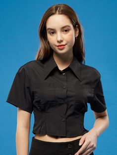 Editor's NotesKOLEAT's trendy yet versatile cropped shirt. Good to be worn in the summer season as layered or alone.- Button closure- Cropped length- Pocket on the chest- Slim silhouette- Versatile and trendy itemMeasurements(in.)One size- Total length: 16.92 in.- Shoulder: 16.14 in.- Chest: 16.73 in.- Hem: 7.48 in.Model infoWoman - Height: 5'74Composition & Care- 100% Nylon- Please check the care labelDesigner- by KOLEAT Solid Cropped Shirt For Spring, Solid Color Cropped Shirt For Spring, Spring Cropped Shirt, Cropped Shirt For Spring, Trendy Collared Cropped Shirt With Buttons, Trendy Collared Crop Top For Summer, Chic Fitted Cropped Shirt With Short Sleeves, Trendy Fitted Crop Top Shirt, Black Cropped Shirt With Short Sleeves For Spring