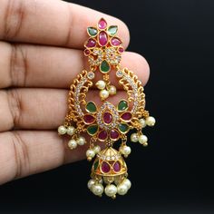 Exquisite Chandbali earrings handcrafted in brass, adorned with sparkling CZ or shimmering pearls. Timeless elegance for any celebration, from birthdays and anniversaries to festival nights." Features: sparkling CZ or shimmering pearls Lightweight and elegant Can be paired with any dress, kurti, or saree Material: Brass Ready to ship from California Free US standard shipping Ready to ship CARE INSTRUCTIONS: 1) Please keep your Jewelry away from moisture and We advise you to do the following things to keep them lasts longer: 2) Please do not wear the jewelry at the time of workout to avoid accidental damage, while using hairspray and perfume. 3) Keep your jewelry away from chemicals. 4) Store jewelries separately, Different kinds of metal react together. To avoid this, store the jewelry in Dress Kurti, Saree Material, Culture Day, Chandbali Earrings, Fantasy Jewelry, Pearl Drop, Timeless Elegance, Outfit Of The Day, Care Instructions