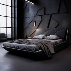 a large bed sitting next to a window in a room with black walls and flooring