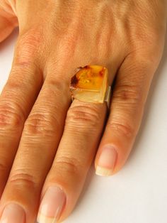 FREE Sipping Amber Ring, Silver 925, orange,  yellow, baltic amberstone, Unique NEW by JewellryWithSoul on Etsy Amber Ring, Amber Stone, Ring Silver, Orange Yellow, Silver 925, Statement Rings, Amber, Rings For Men, Modern Design