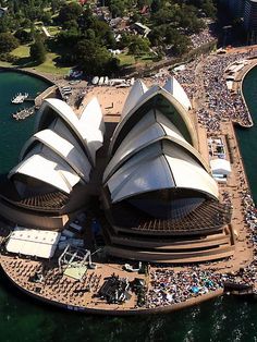 an aerial view of the sydney opera house, australia's largest concert venue and tourist attraction