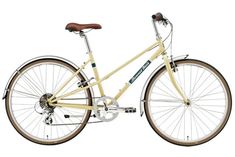 a yellow bicycle is shown with brown spokes on the front and back wheel rims