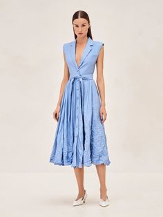 Embrace sophistication and style in the Beau Dress - a perfect fusion of sharp lapels and a fluid, plunging V-neckline. The crisp top harmonizes with the delicate crinkles of the skirt, creating a dynamic texture that moves effortlessly with you. A cinched waist, accented by a matching fabric belt, flatters your figure for a truly stunning silhouette. Skirt Jumpsuit, Fabric Belt, Cinched Waist, Skirt Pants, Jacket Tops, Blue Dresses, Blazer Jacket, Jumpsuit Romper, Ready To Wear