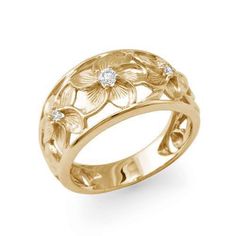 Adorned with tropical flowers, ferns, leaves and intricate scrollwork, our unique Hawaiian Heirloom designs are cherished Island keepsakes with tradition that traces back to Hawai‘i’s Queen Lili'uokalani. Hawaiian Heirloom Plumeria Design Ring 14k Yellow Gold 11mm Diamond: 0.11 CTW Ring Size 5-9  Additional sizes avail Hawaiian Ring, Hawaiian Wedding Rings, Ring Redesign, Scroll Ring, Hawaiian Heirloom Jewelry, Heirloom Ring, Redesign Ideas, Dream Rings, Heirloom Rings